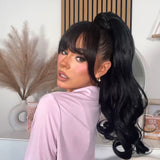 Copy this trendy hairstyle with with 23" Curly Ponytail