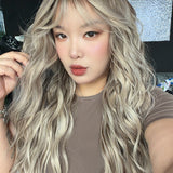 JBEXTENSION 28 Inches Scalpiana Long Wave Blonde Highlight 3.5X4 Hard Silky Top Natural Scalp Effect Wig with Bangs OSSIE LONG - BLONDE HIGHLIGHT